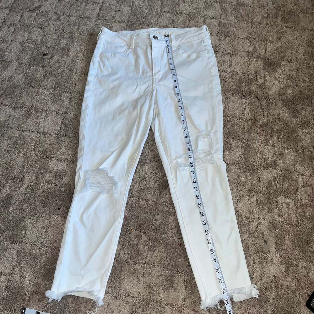 American Eagle White Distressed High-Waisted Jeans with Frayed Hem size 14